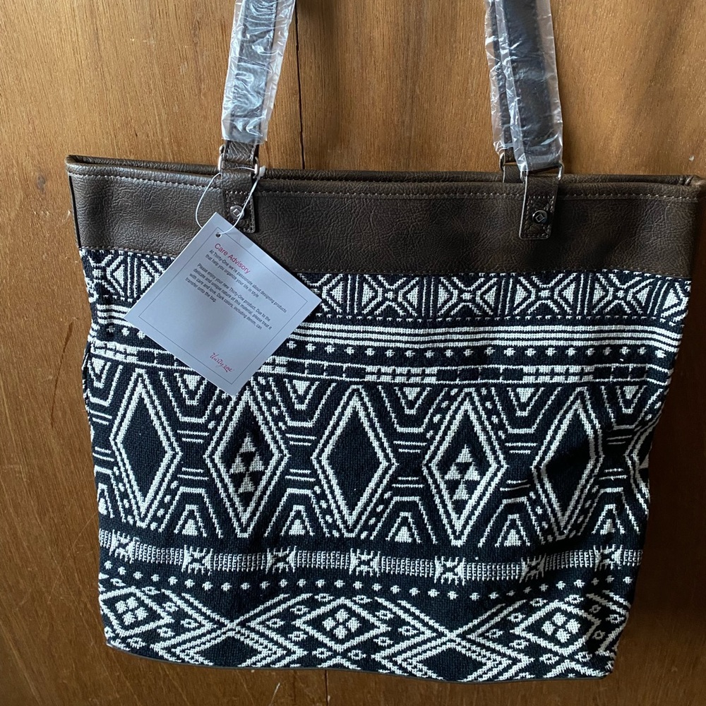 Thirty one reversible tote. Brand New with tag and bag it came in